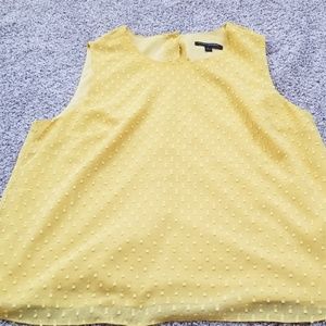 Sleeveless back button shell
